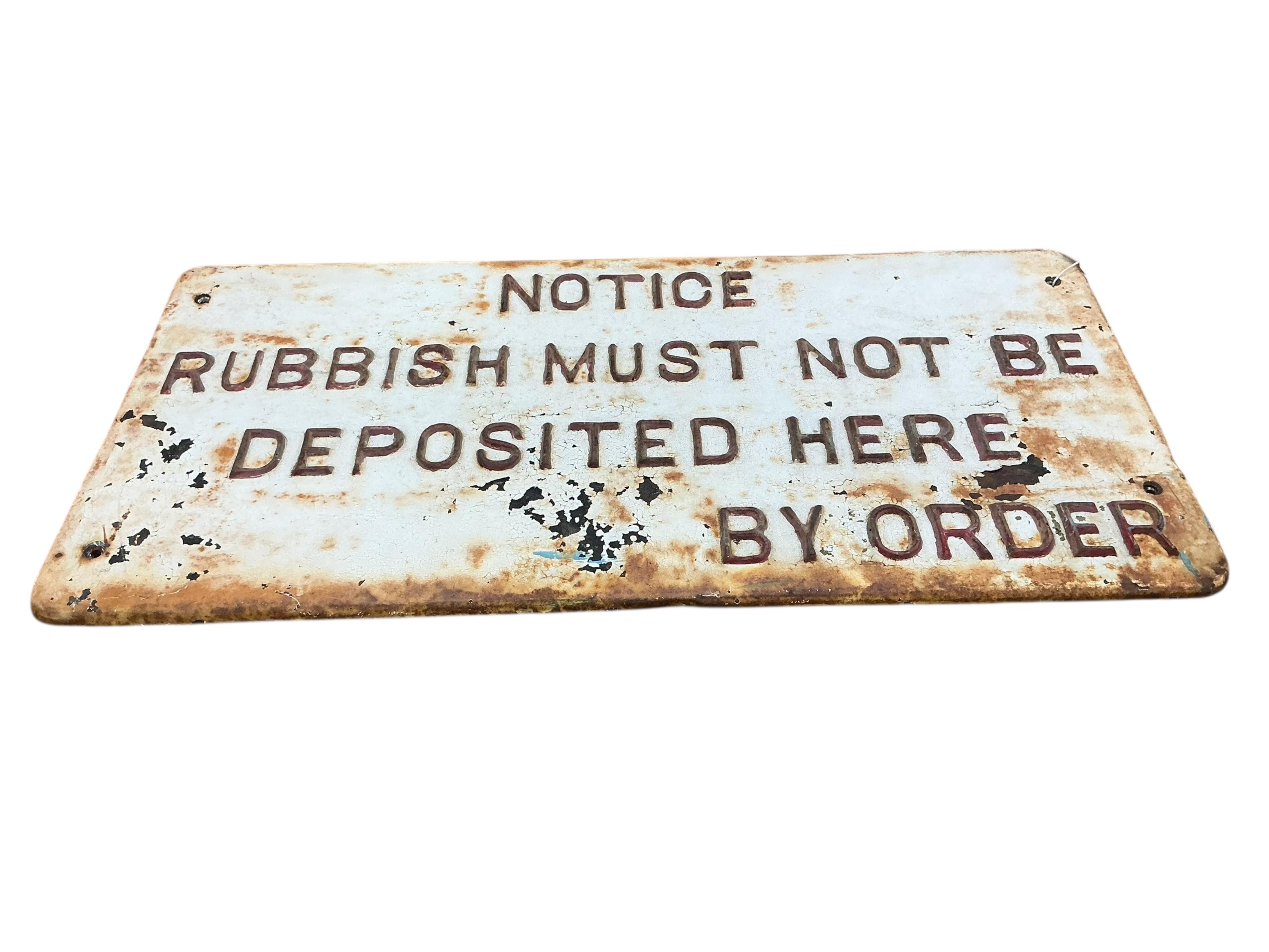 Vintage rectangular cast iron sign, “ Notice Rubbish Must Not Be Deposited Here By Order”. Width 71cm, height 34cm.